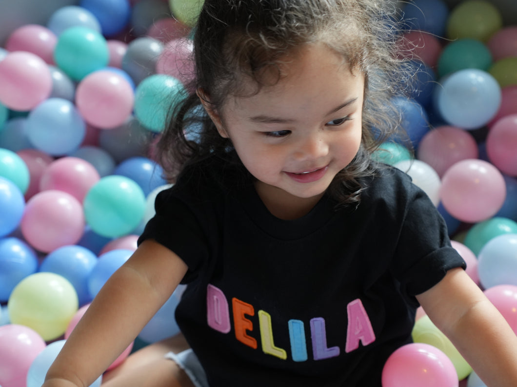 Personalised Black Kids T-shirt in Girl Rainbow