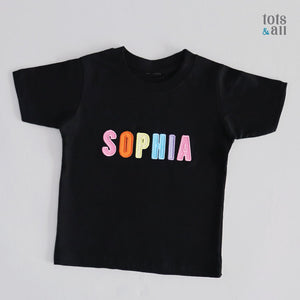 Personalised Black Kids T-shirt in Girl Rainbow